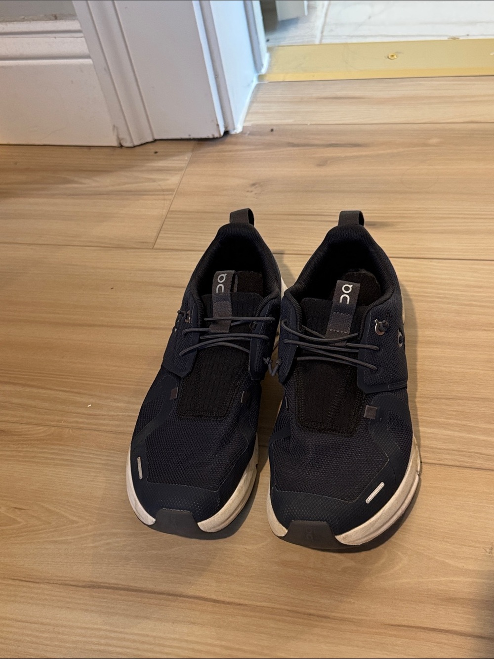 On Running Men’s Athletic Sneakers in Black and White